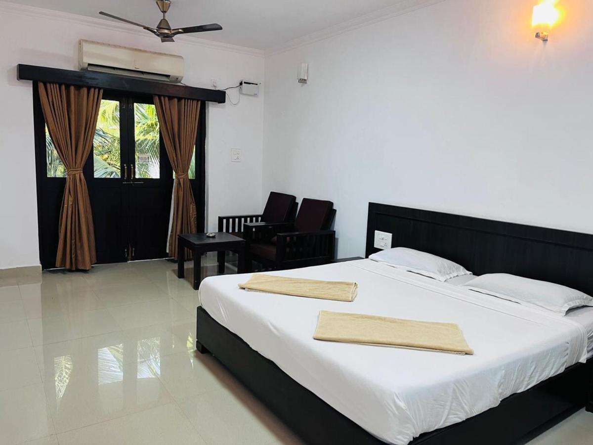 Naga Cottages Morjim Exterior foto