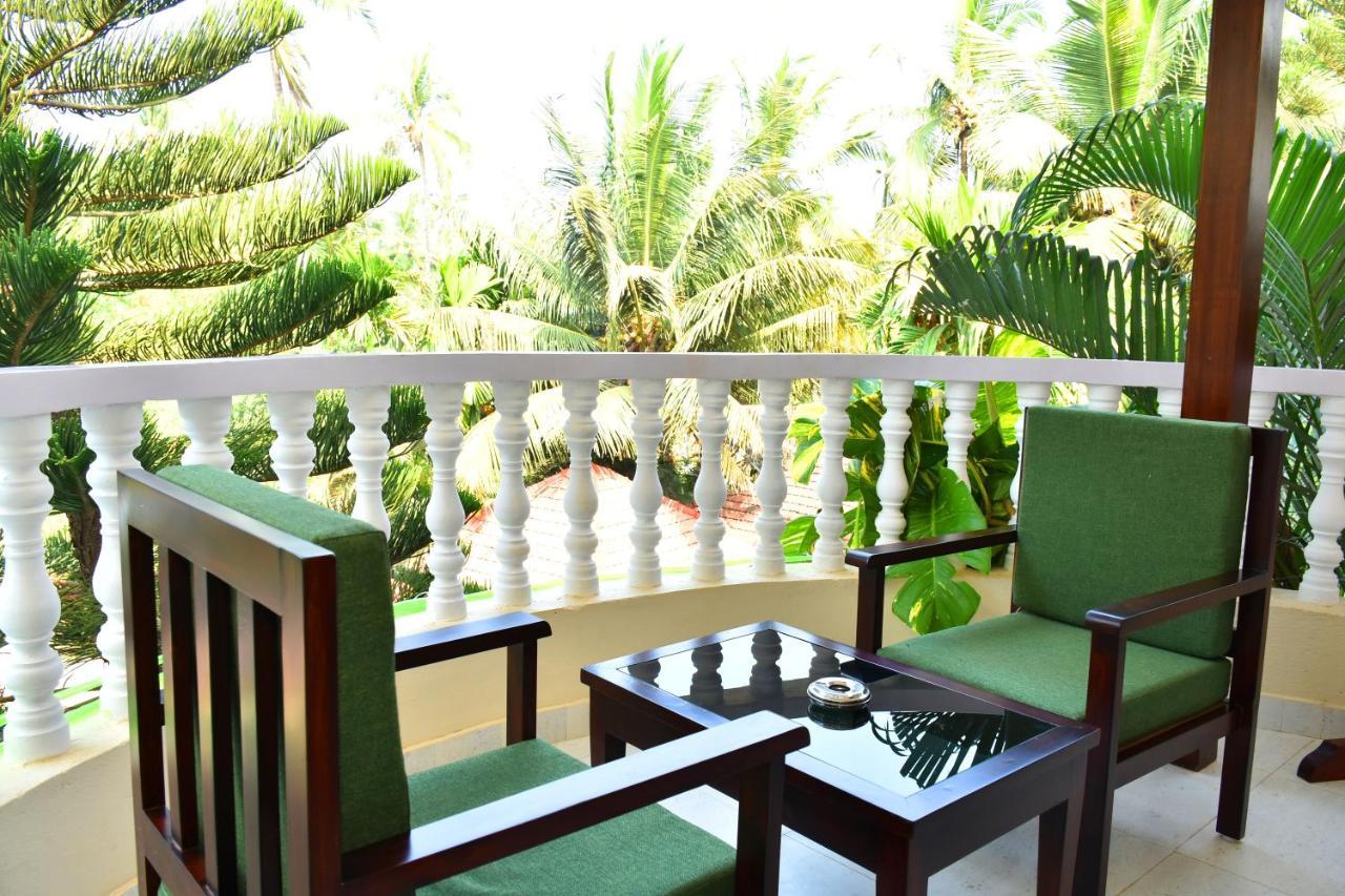 Naga Cottages Morjim Exterior foto